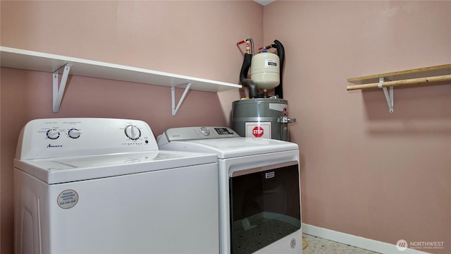 22470 Sunridge Way NE, Poulsbo, WA 98370 - washroom featuring washing machine and dryer, water heater, and baseboards