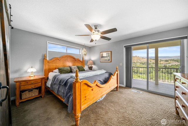 1901 Sleepy Hollow Rd, Wenatchee, WA 98801 - carpeted bedroom featuring access to outside, a ceiling fan, and baseboards