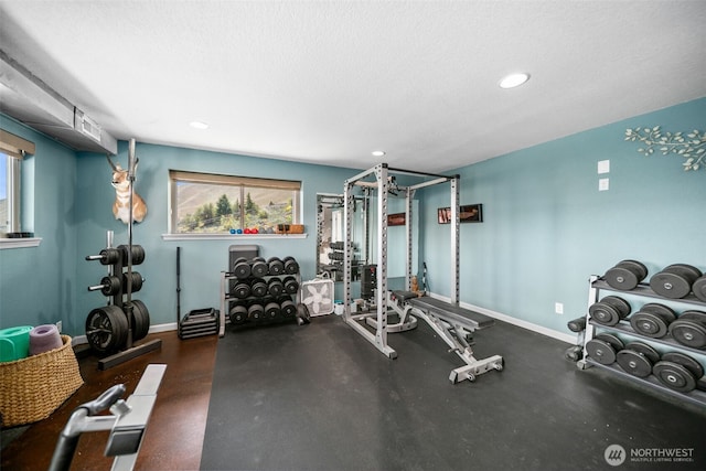 1901 Sleepy Hollow Rd, Wenatchee, WA 98801 - exercise area featuring plenty of natural light, recessed lighting, baseboards, and a textured ceiling