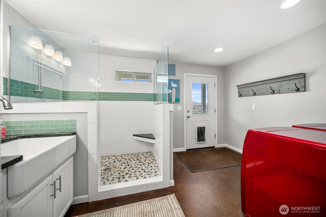 1901 Sleepy Hollow Rd, Wenatchee, WA 98801 - full bathroom featuring finished concrete flooring, a walk in shower, vanity, baseboards, and recessed lighting