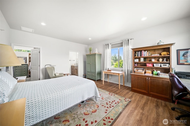 1901 Sleepy Hollow Rd, Wenatchee, WA 98801 - bedroom with multiple windows, wood finished floors, a desk, recessed lighting, and connected bathroom