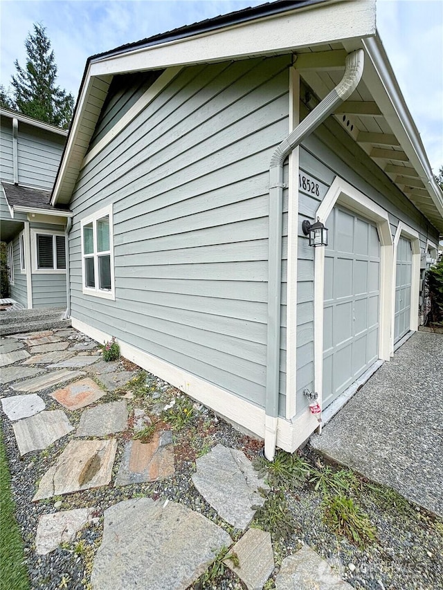 18528 20th Dr SE, Bothell, WA 98012 - view of side of property with a garage