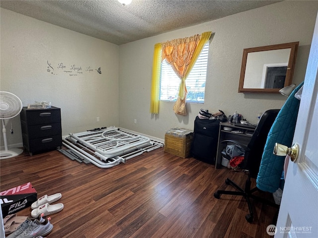 720 S 37th St, Tacoma, WA 98418 - bedroom featuring wood finished floors, a textured ceiling, and a textured wall