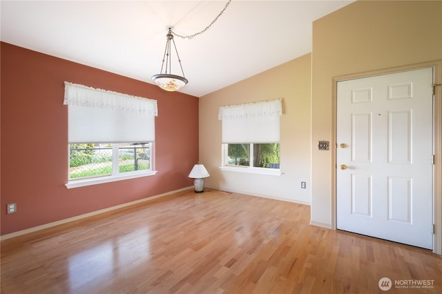 5419 N Court St, Ruston, WA 98407 - empty room featuring vaulted ceiling, light wood-type flooring, and baseboards
