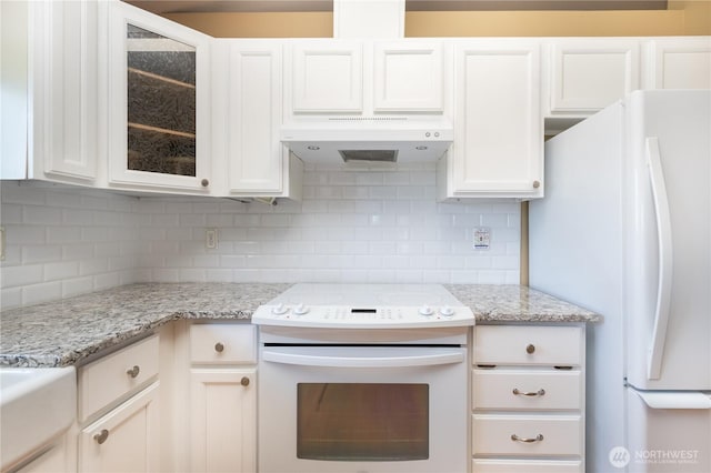 5419 N Court St, Ruston, WA 98407 - kitchen featuring white appliances, under cabinet range hood, backsplash, white cabinets, and glass insert cabinets