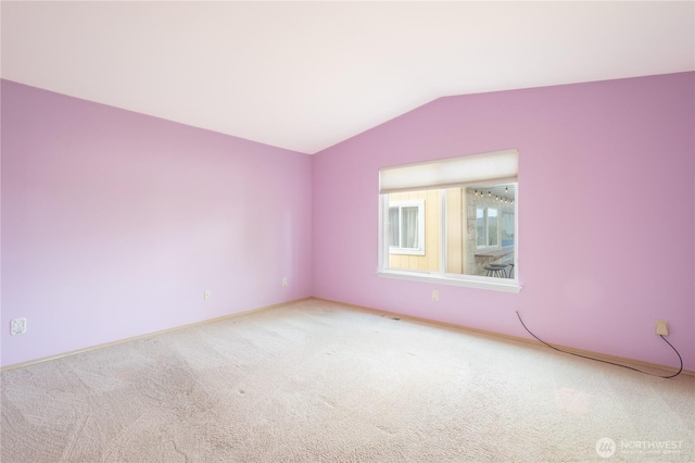 5419 N Court St, Ruston, WA 98407 - spare room with carpet, vaulted ceiling, and baseboards