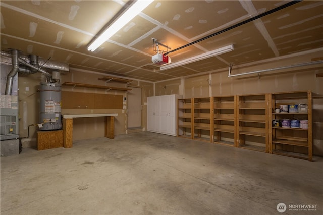 5419 N Court St, Ruston, WA 98407 - garage featuring secured water heater and a garage door opener