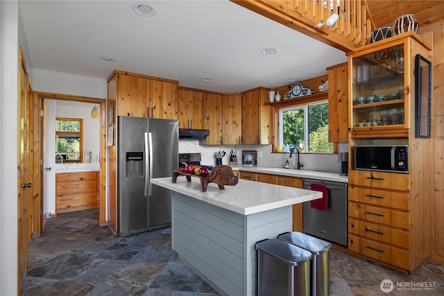 51 E Glamis Ct, Shelton, WA 98584 - kitchen with stainless steel fridge, dishwasher, a sink, black microwave, and under cabinet range hood