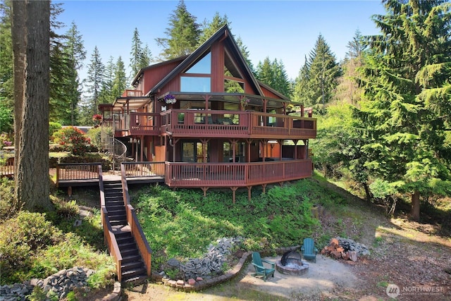 51 E Glamis Ct, Shelton, WA 98584 - rear view of house featuring an outdoor fire pit, a deck, and stairway