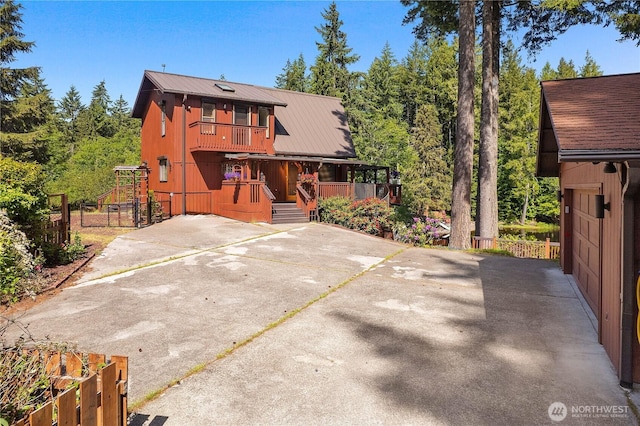51 E Glamis Ct, Shelton, WA 98584 - view of front of house featuring a porch and metal roof