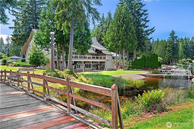51 E Glamis Ct, Shelton, WA 98584 - rear view of house featuring a water view and a yard