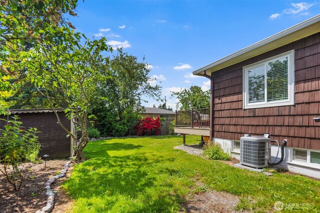 19027 37th Ave S, Seatac, WA 98188 - view of yard with central AC unit and a wooden deck