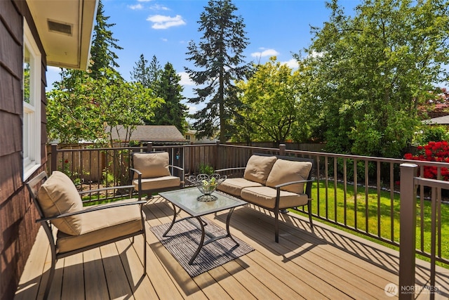 19027 37th Ave S, Seatac, WA 98188 - wooden deck with an outdoor living space