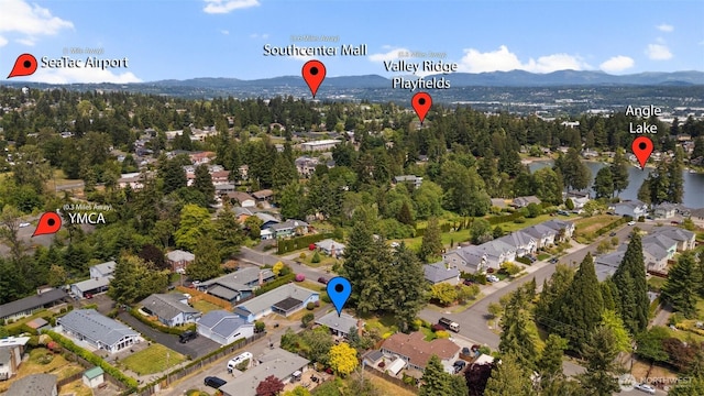 19027 37th Ave S, Seatac, WA 98188 - aerial view of property's location with mountains and nearby suburban area