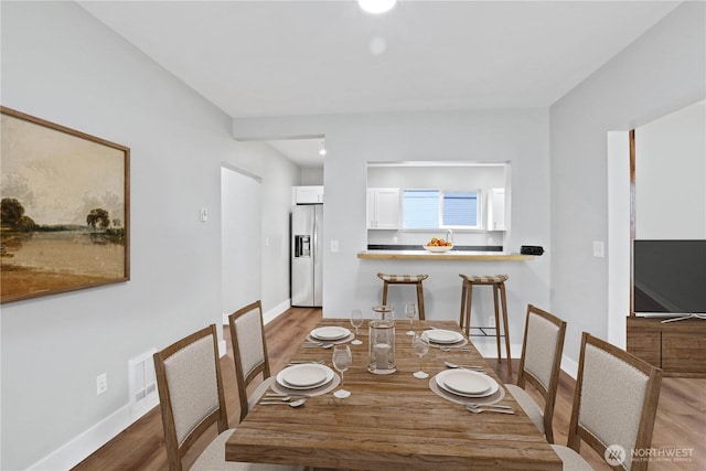 45885 Division St, Concrete, WA 98237 - dining area featuring wood finished floors and baseboards