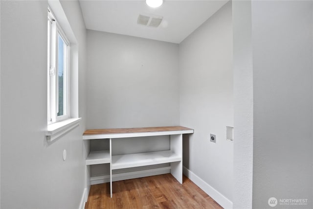 45885 Division St, Concrete, WA 98237 - washroom with hookup for an electric dryer, baseboards, and wood finished floors