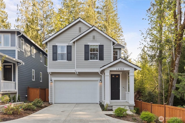14205 272nd Pl NE, Duvall, WA 98019 - view of front facade featuring an attached garage and driveway