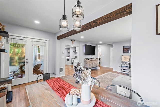 140 Tremont St, Port Orchard, WA 98366 - dining room with wood finished floors, french doors, recessed lighting, baseboards, and beamed ceiling