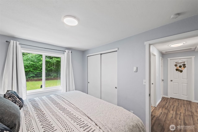 140 Tremont St, Port Orchard, WA 98366 - bedroom with wood finished floors, a closet, and baseboards