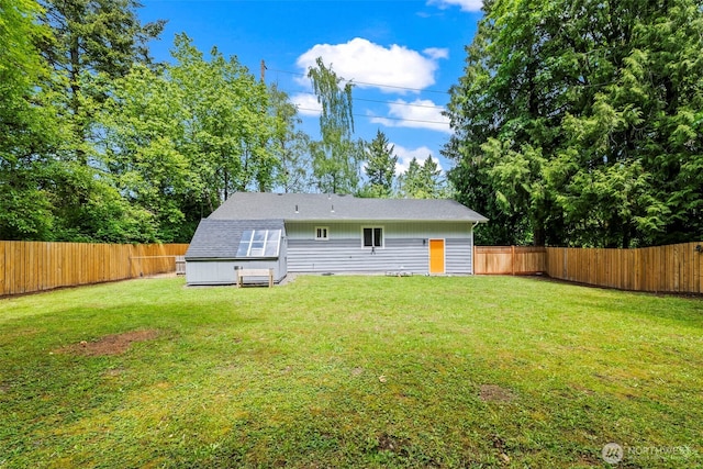 140 Tremont St, Port Orchard, WA 98366 - back of house with an outdoor structure and roof with shingles