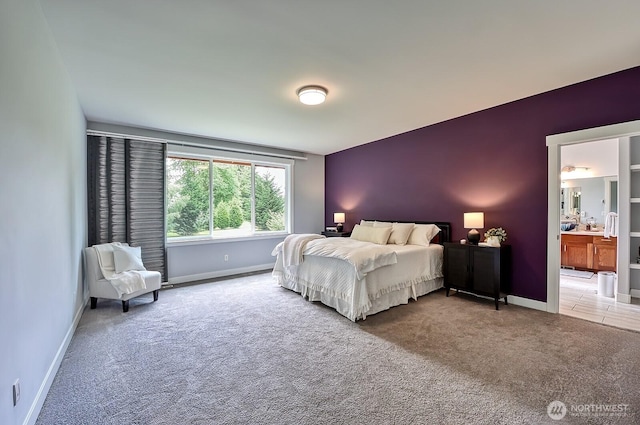 936 W Axton Rd, Bellingham, WA 98226 - bedroom featuring light colored carpet, baseboards, and ensuite bathroom