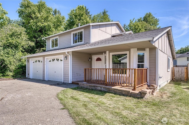 912 Eagle Crest Pl, Port Orchard, WA 98366 - view of front of house featuring covered porch, asphalt driveway, and a shingled roof