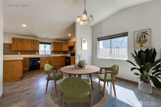 912 Eagle Crest Pl, Port Orchard, WA 98366 - dining area with lofted ceiling, a chandelier, wood finished floors, recessed lighting, and baseboards