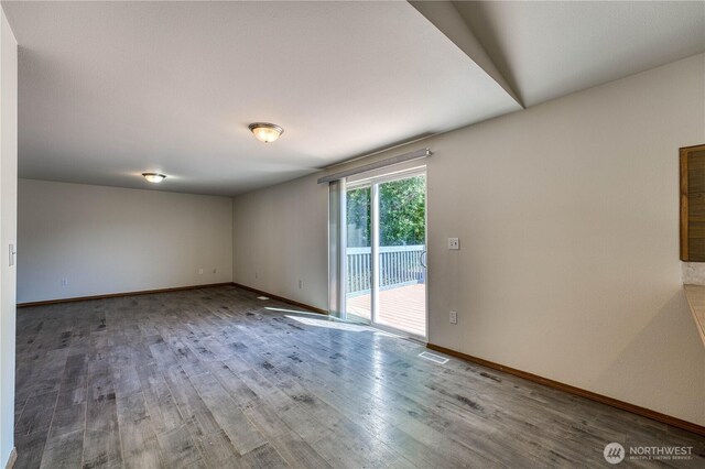 912 Eagle Crest Pl, Port Orchard, WA 98366 - spare room featuring wood finished floors and baseboards