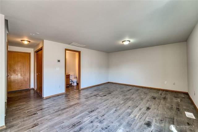912 Eagle Crest Pl, Port Orchard, WA 98366 - spare room featuring wood finished floors and baseboards