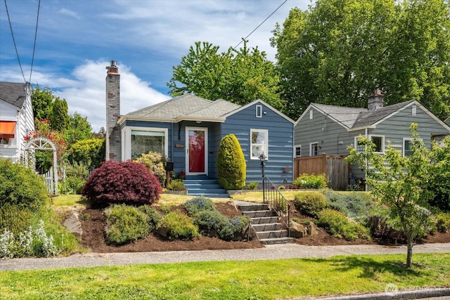 7530 25th Ave NW, Seattle, WA 98117 - bungalow-style home featuring a chimney