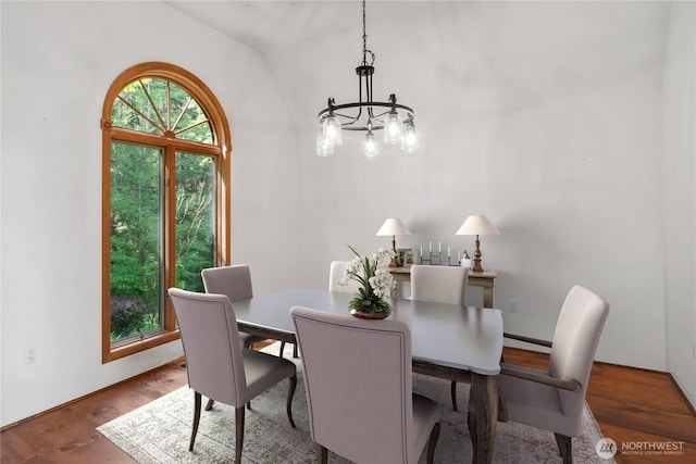 160 Bywater Way, Port Ludlow, WA 98365 - dining area with a chandelier, healthy amount of natural light, wood finished floors, and lofted ceiling