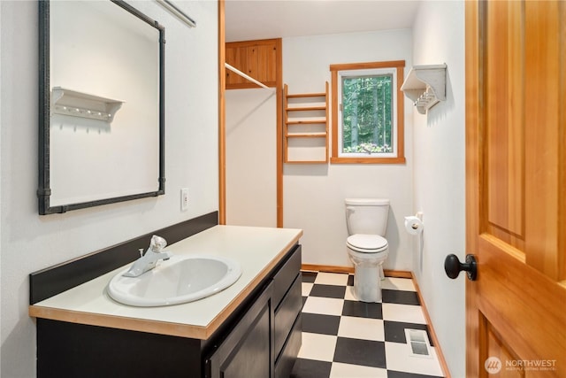 160 Bywater Way, Port Ludlow, WA 98365 - bathroom with tile patterned floors, vanity, toilet, a shower, and baseboards