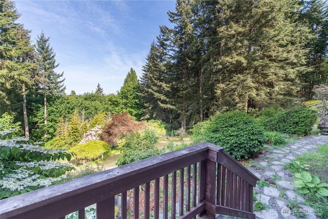 160 Bywater Way, Port Ludlow, WA 98365 - wooden deck with a wooded view