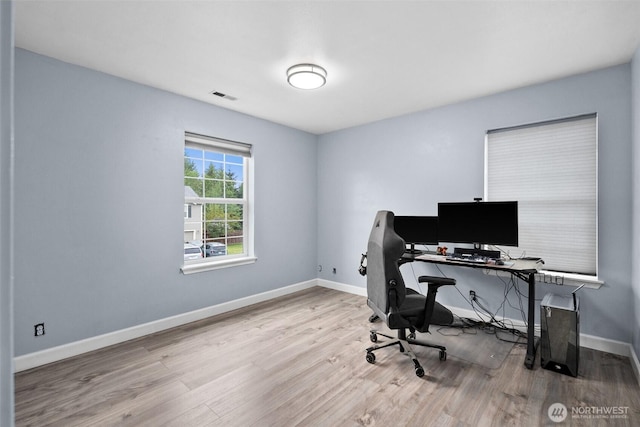 20723 197th Ave E, Orting, WA 98360 - office area featuring wood finished floors and baseboards