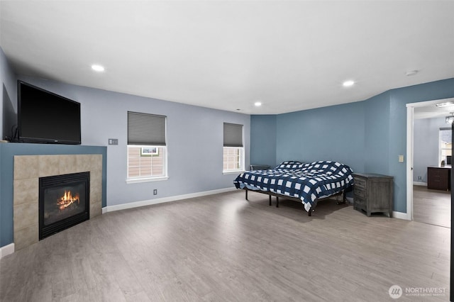 20723 197th Ave E, Orting, WA 98360 - playroom featuring healthy amount of natural light, baseboards, wood finished floors, and recessed lighting