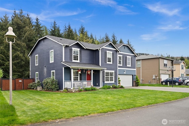 20723 197th Ave E, Orting, WA 98360 - traditional-style home featuring a porch, asphalt driveway, and a garage