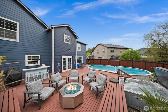 20723 197th Ave E, Orting, WA 98360 - view of pool with a deck, an outdoor living space with a fire pit, french doors, and grilling area