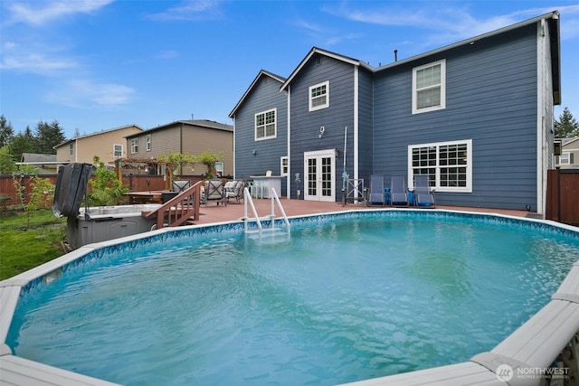 20723 197th Ave E, Orting, WA 98360 - outdoor pool with french doors and a patio