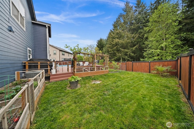 20723 197th Ave E, Orting, WA 98360 - view of yard featuring a vegetable garden and a deck