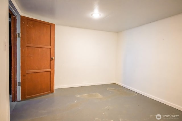 813 E 3rd Ave, Ellensburg, WA 98926 - empty room featuring concrete flooring and baseboards