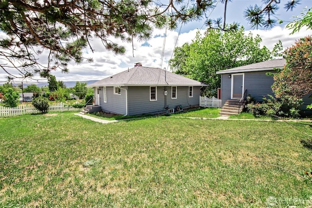 813 E 3rd Ave, Ellensburg, WA 98926 - back of property with a chimney