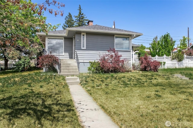 813 E 3rd Ave, Ellensburg, WA 98926 - bungalow-style house with a chimney and roof with shingles