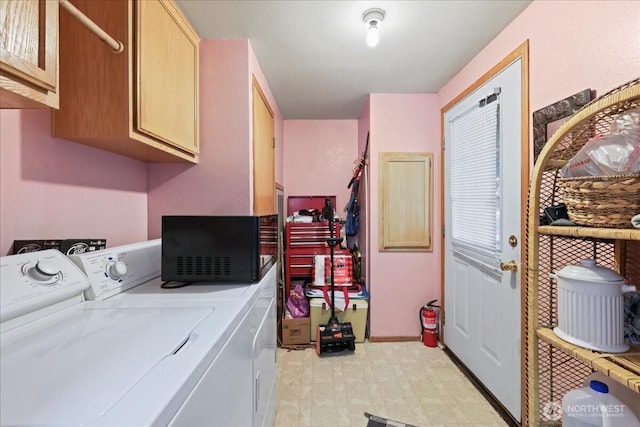 741 Twin Lakes Rd, Cle Elum, WA 98922 - laundry room with cabinet space, washer and clothes dryer, and light flooring