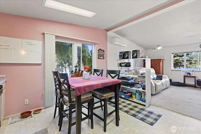 741 Twin Lakes Rd, Cle Elum, WA 98922 - dining space featuring plenty of natural light, a wall mounted AC, lofted ceiling, and light floors