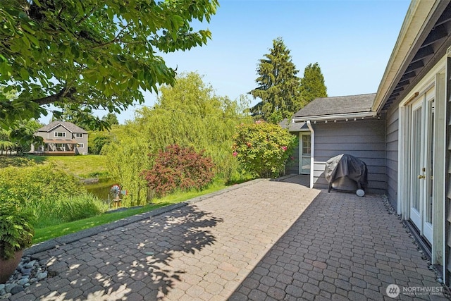 11112 E Riverside Dr, Bothell, WA 98011 - view of patio / terrace featuring a grill