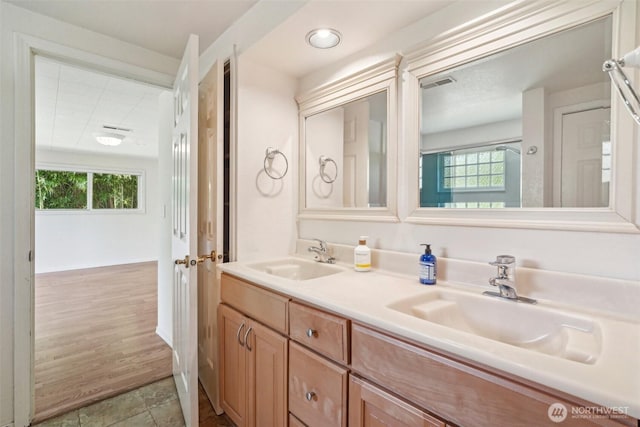 11112 E Riverside Dr, Bothell, WA 98011 - full bathroom with double vanity and tile patterned floors