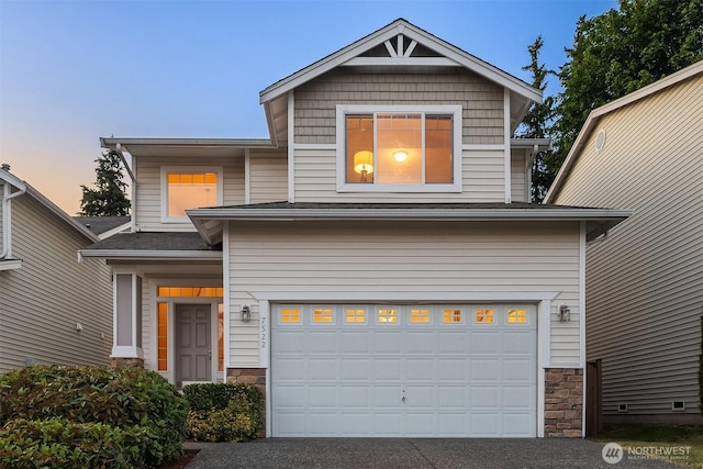 7522 NE 204th Pl, Kenmore, WA 98028 - view of front of home with an attached garage, stone siding, and driveway