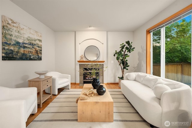 7522 NE 204th Pl, Kenmore, WA 98028 - living area with wood finished floors and a tiled fireplace