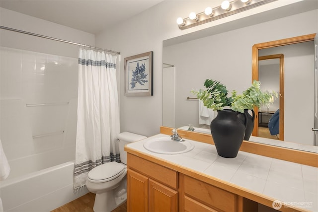 7522 NE 204th Pl, Kenmore, WA 98028 - full bathroom with vanity, toilet, shower / tub combo with curtain, and wood finished floors
