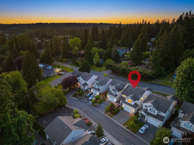 7522 NE 204th Pl, Kenmore, WA 98028 - aerial perspective of suburban area featuring a heavily wooded area